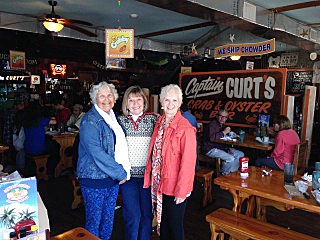 Rosie Carpenito, Sue Clements Wise and Gloria Voorhees Rubin sharing memories on 2/13/15 at Captain Curts Crab and Oyster Bar in Siesta Key, FL